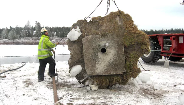 A Potts Drilling workman wraps up the decommissioning