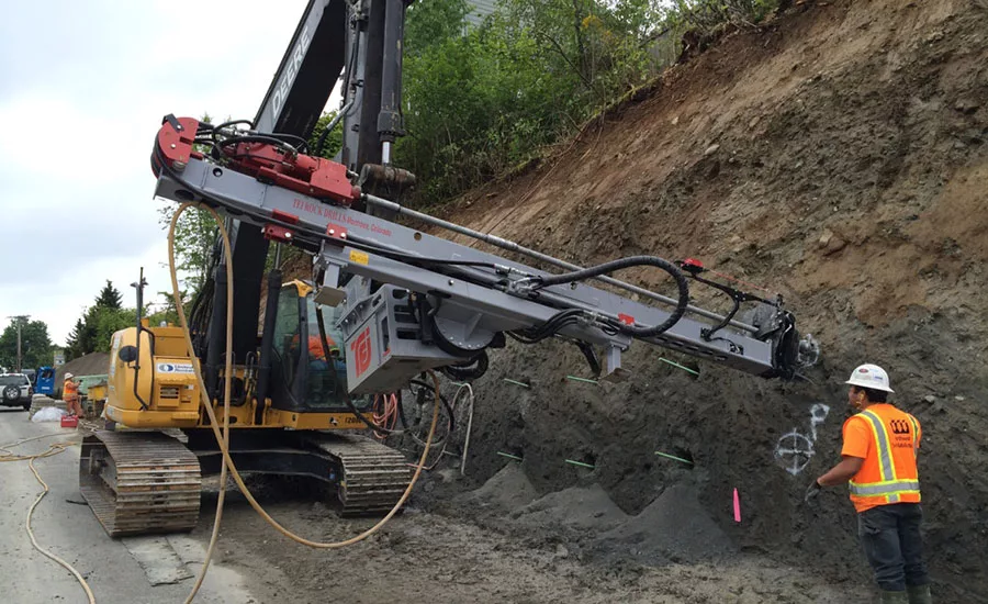 installing soil nails for a shotcrete wall system in Duvall, Wash.