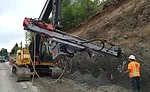 installing soil nails for a shotcrete wall system in Duvall, Wash.
