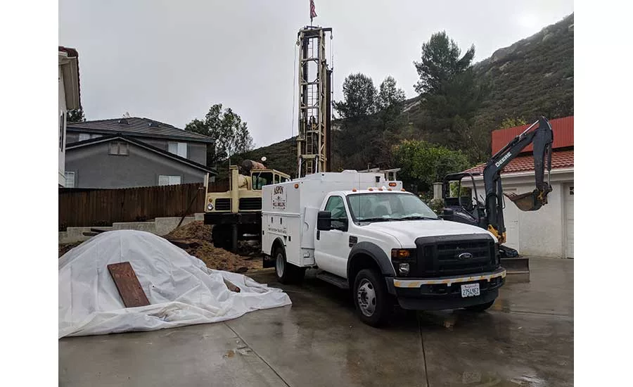 T4 drilling rig in small backyard