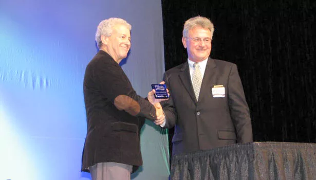 Dr. Leonard Konikow of USGS, left, accepts one of the Life Member Awards from NGWA President Daniel T. Meyer.