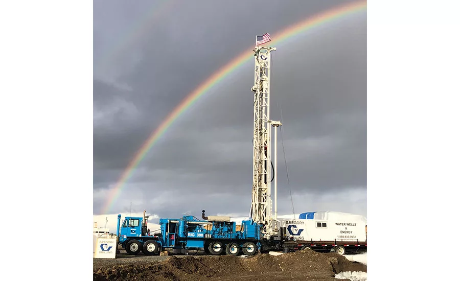 double rainbow over drilling rig