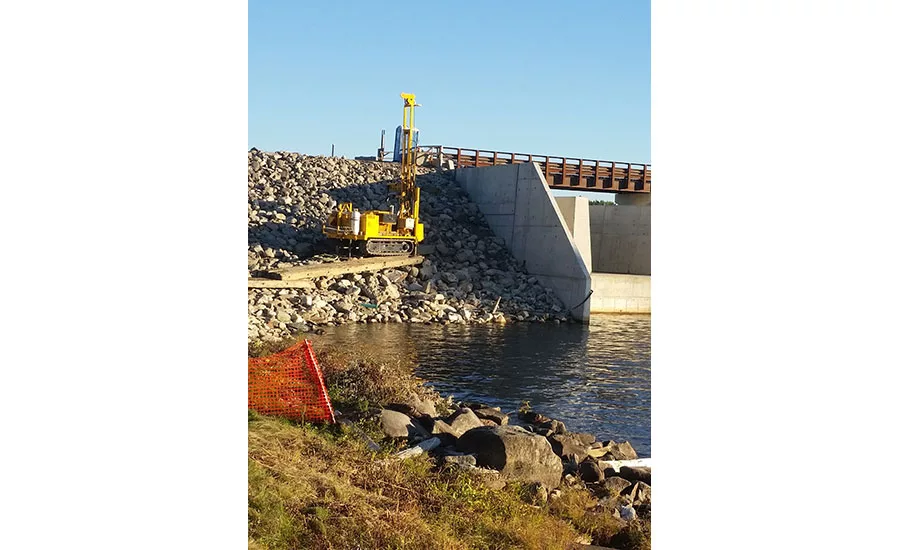installing a monitoring well in Rangeley, Maine