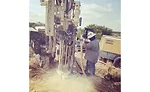 Geoprobe 7822DT on an air rotary job in Carrizo Springs, Texas