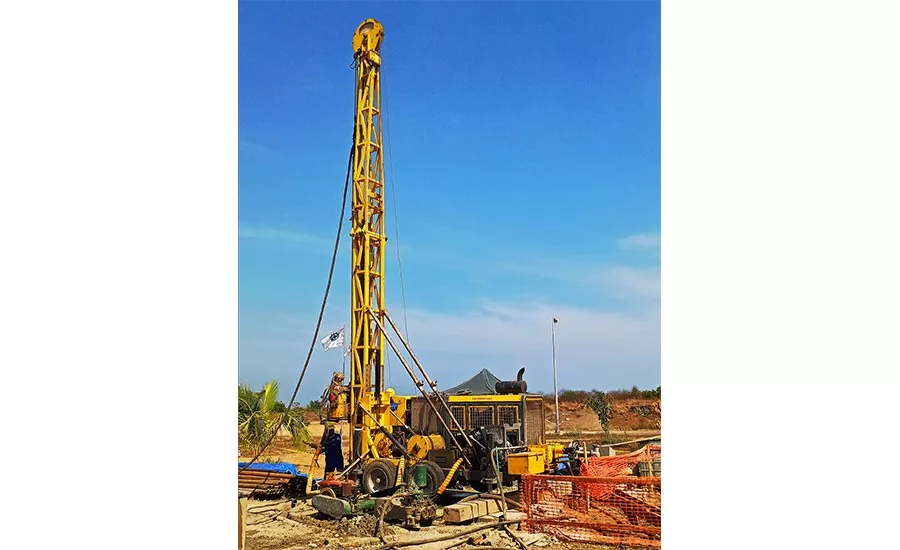 installing a monitoring well with an Atlas Copco rig in East Java, Indonesia