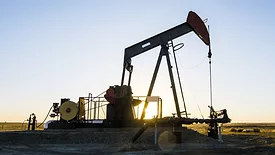 Oil rig in the middle of the field