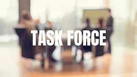 An image of a board meeting in the background