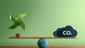 An image of CO2 on a balance beam