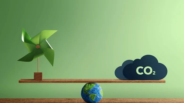 An image of CO2 on a balance beam