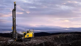 An image of a mining rig with an ominous background