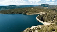An image of a water reservoir in the mountains