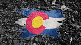 An image of colorado flag with a coal background