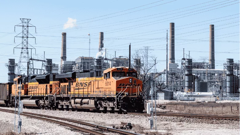 An image of a train delivering coal