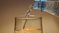 PFAsinWater.png An image of someone pouring water