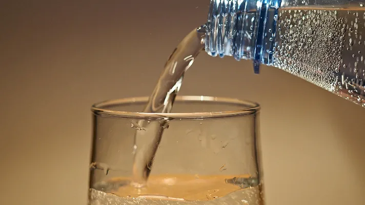 PFAsinWater.png An image of someone pouring water