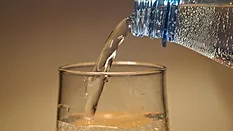 An image of someone pouring water