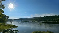 An image of the Potomac River and the sun