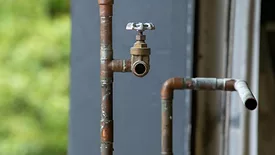 An image of a rusty water pipe