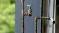 An image of a rusty water pipe