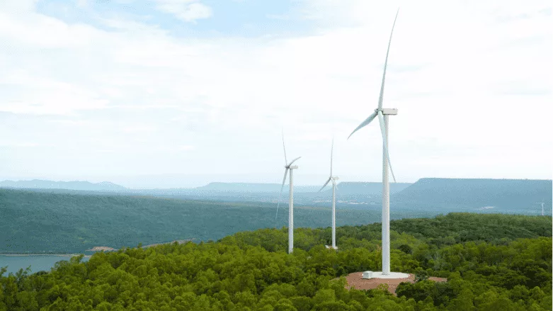 Wind Turbines spin in a field