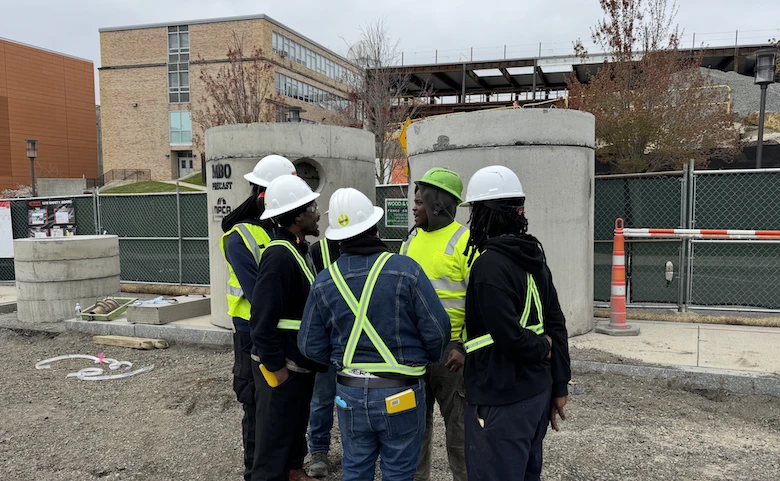 A group of water drillers on a drilling site
