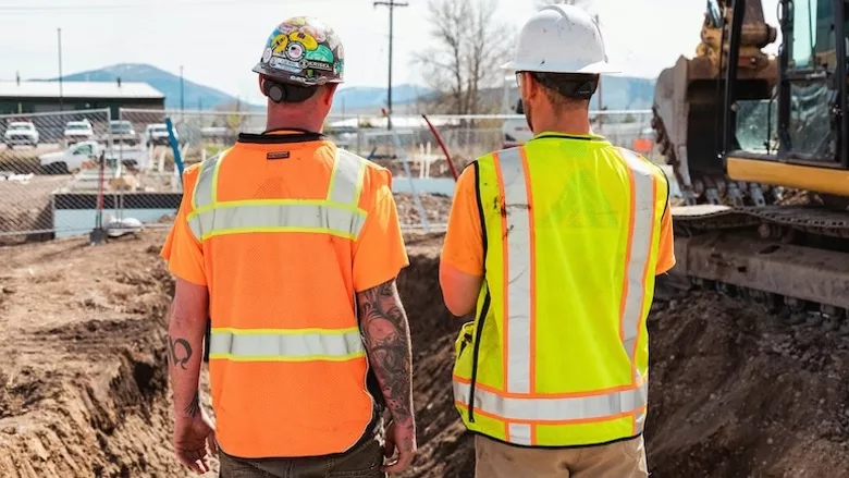 2 workers at a construction site