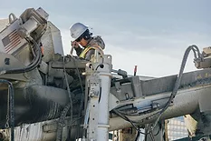 Worker cleaning a rig