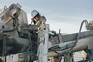 chandler-denise-bvhMsP6MrE8-unsplash.jpg Worker cleaning a rig