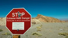 Extreme Heat A stop sign warning of heat dangers