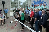 Jubilee Brandi During from Wells Water Systems cuts the ribbon to open the trade show floor of the annual South Atlantic Jubilee on Sunday, July 26, 2026