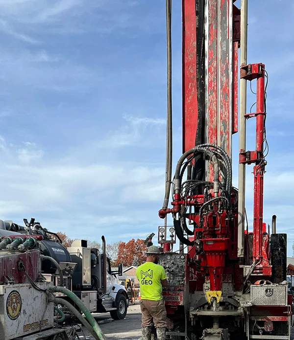 A drilling professional with a drilling rig