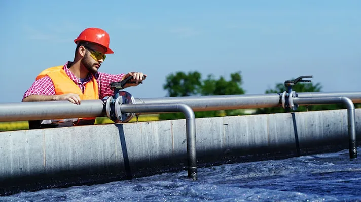 waterworkforce.jpg Man working on water piping systems