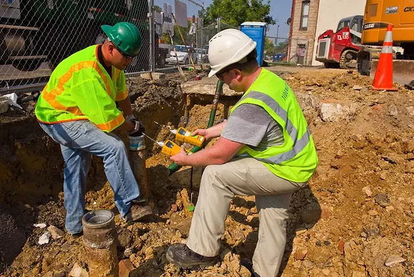 Guys working an injection well