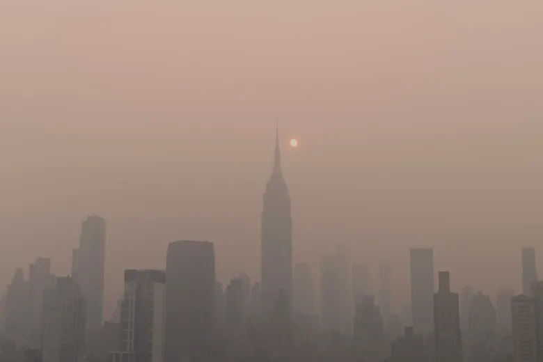 Wildfire smog envelopes a city