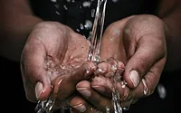 Someone washing their hands