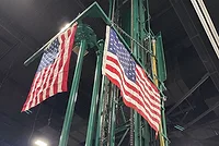 American flags adorn a drill rig