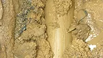 Fresh PVC can be seen in the mud