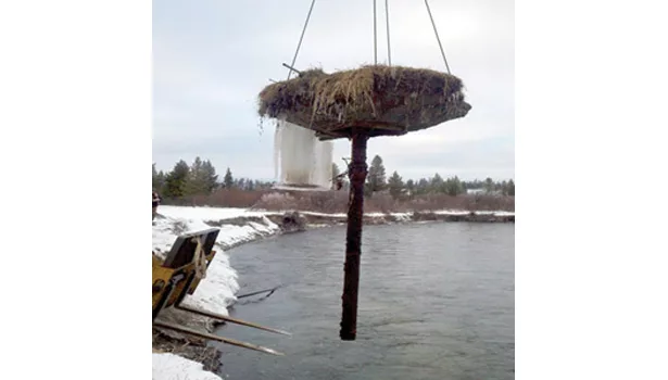 Crane lifts casing out of Madison river