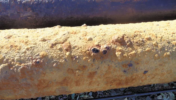 Mineral buildup and encrustation can significantly affect well production, making it a target for chemical rehabilitation.