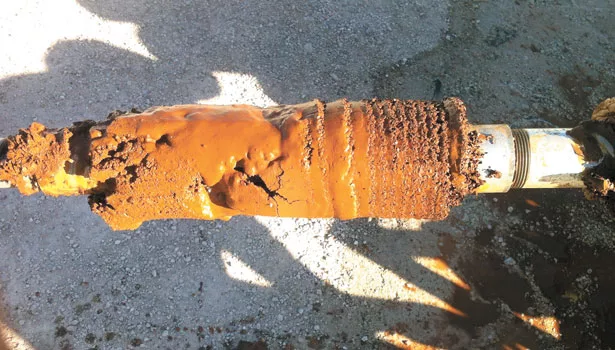 Sludge on a brush in North Judson, Ind. Preventative maintenance can fend off rehabilitation and keep a well producing.