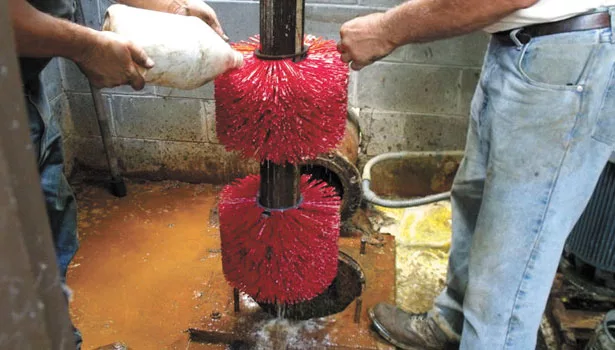 The most basic mechanical method of rehabilitation is simply running a brush down the hole and scrubbing the inside of the casing wall.