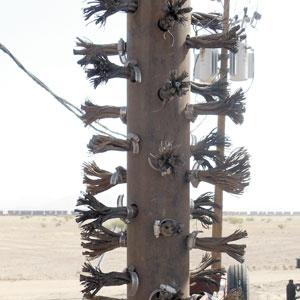 This brush was made by a contractor from steel pipe and cable, but many companies also sell them.
