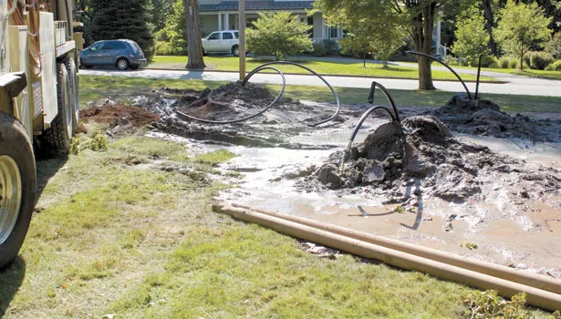 The company installs a vertical earth loop, drilling four bores at the corners of a 20-foot by 20-foot square.