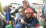 Edward Powell with local kids during a rehab project in Ethiopia