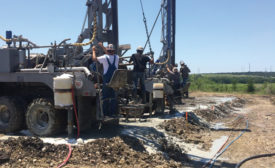 Side-by-side rigs install geothermal boreholes