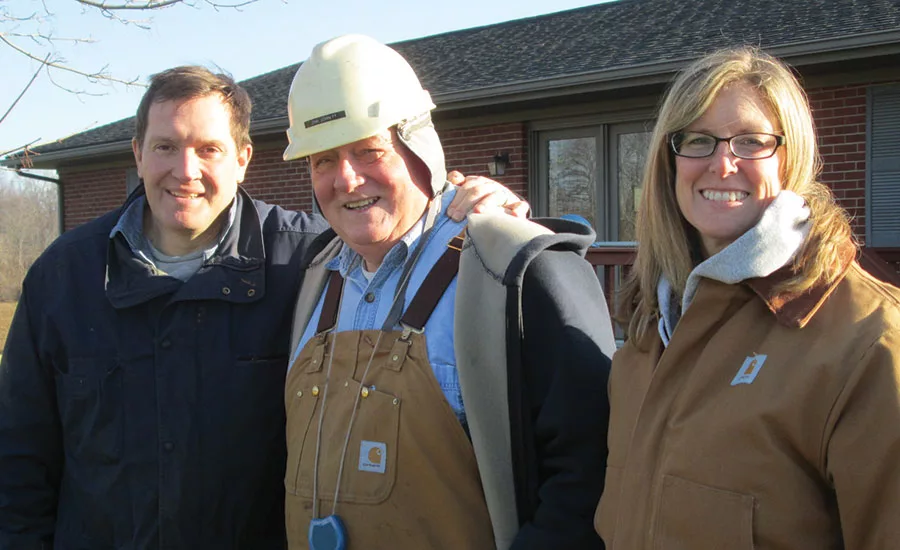 John Schmitt with son-in-law and daughter
