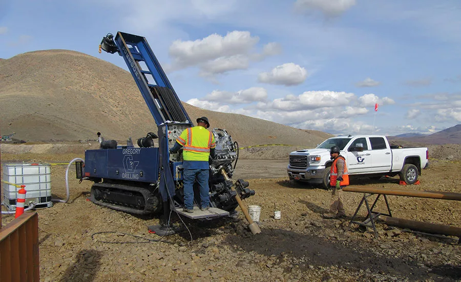 Gregory drilling crew in the field