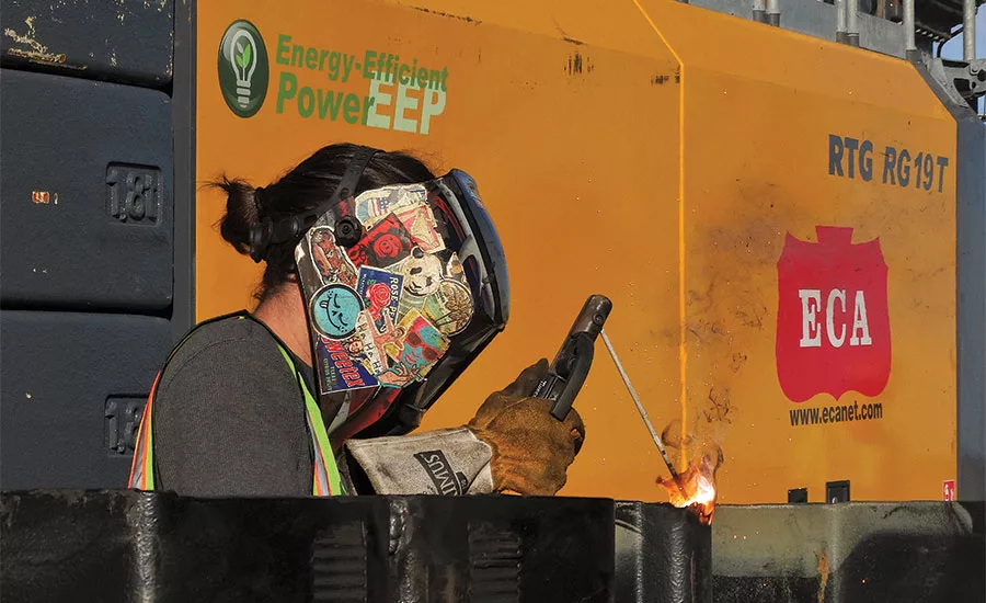 a Burke employee working behind the piling rig