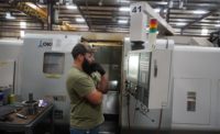 Brandon Lamar of Matrix Drilling Products operates one of the company’s CNC machines